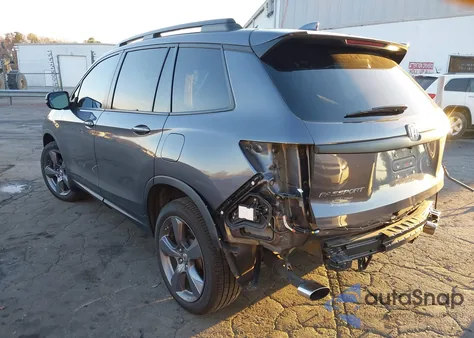 2021 Honda Passport 2Wd Touring z USA, uszkodzony, nr VIN 5FNYF7H98MB012918
